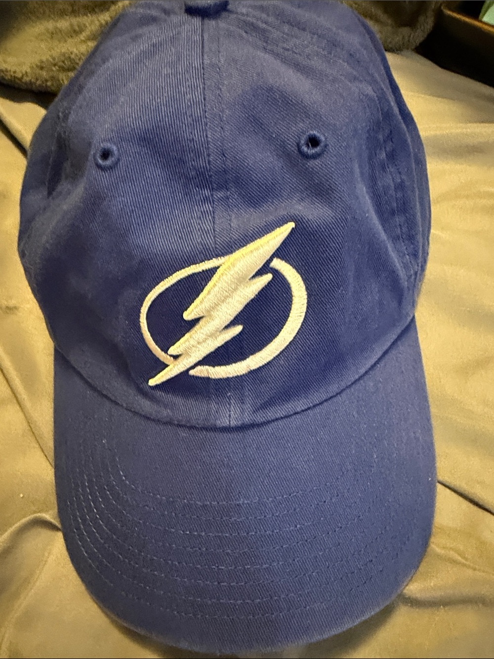 Blue Baseball Cap with White Lightning Emblem